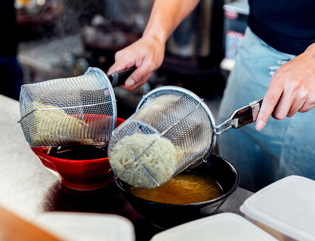 Chef preparing ramen noodles